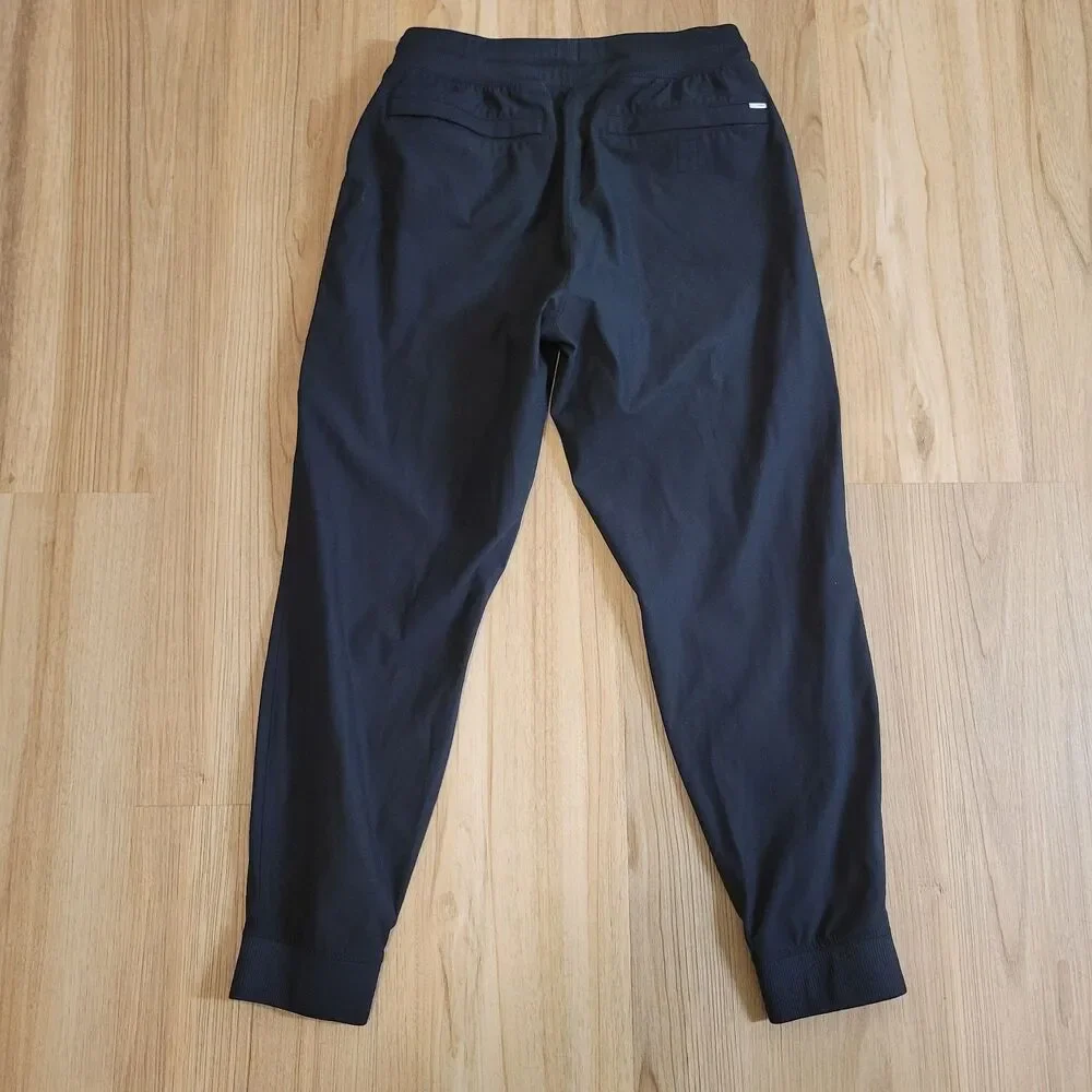 Vuori Meta Jogger Men Medium Black Drawstring Stretch Performance Pants V436